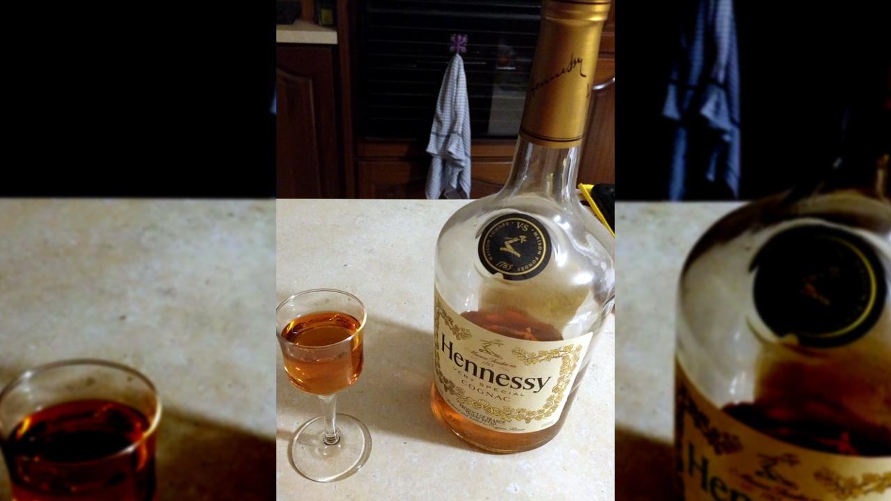 Bottle and Glass of Hennessy Cognac