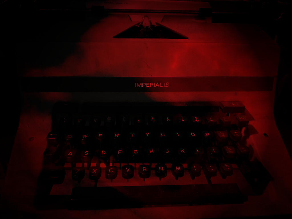 Red faded typewriter